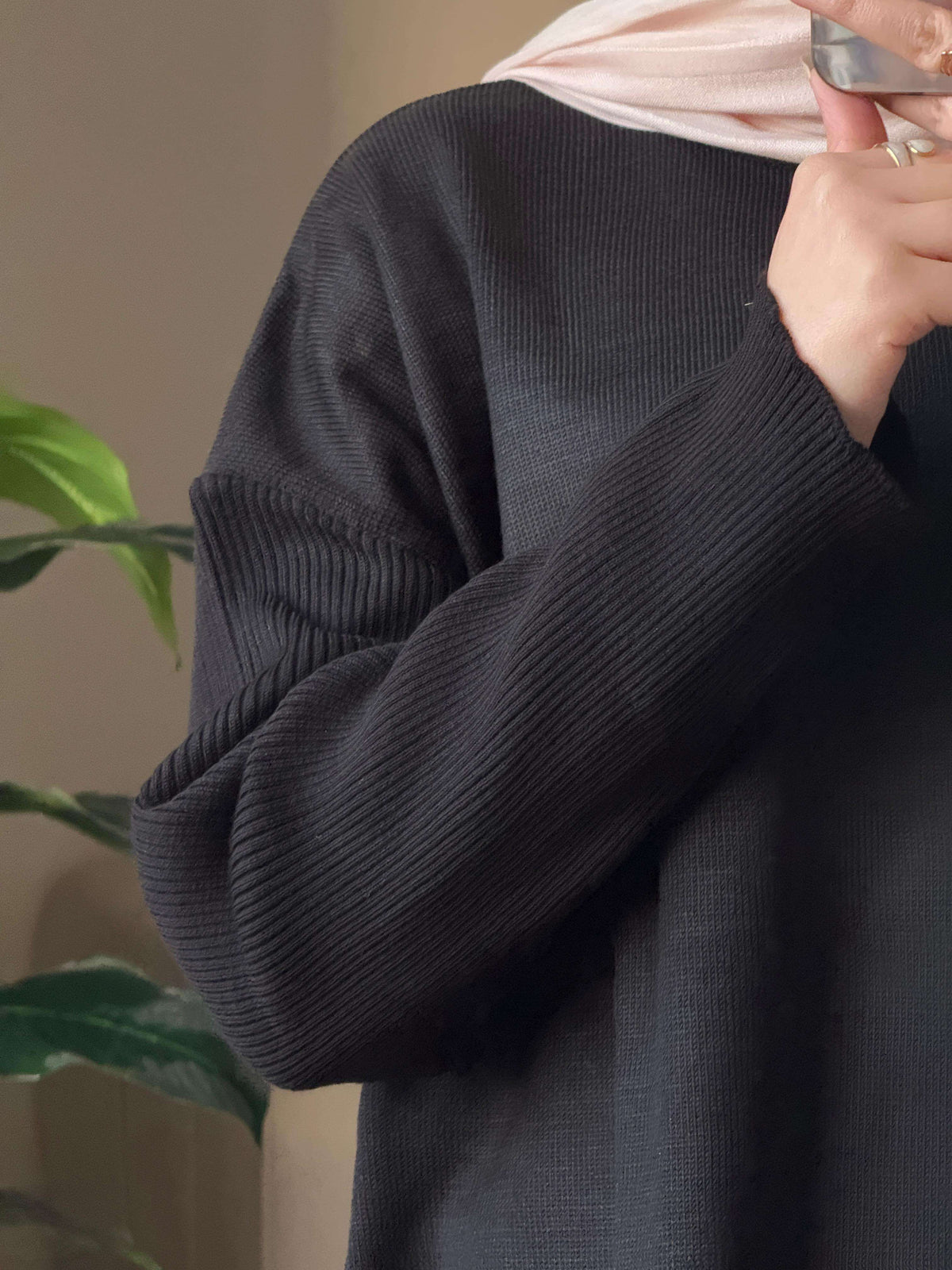 Black pullover with side opening