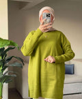 Kiwi pullover with side opening.