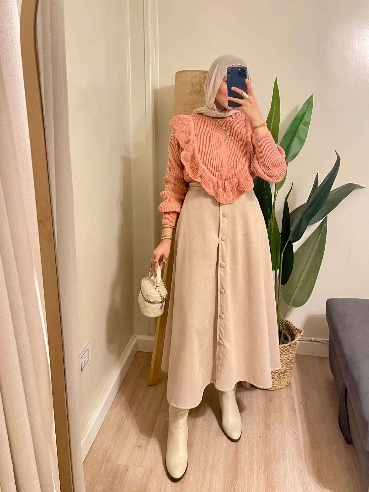 Beige Suede skirt with Buttons.
