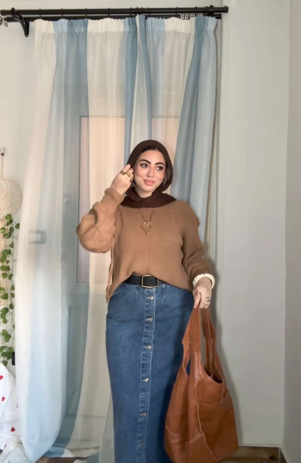 Cafe knitted pullover with tie sleeves.