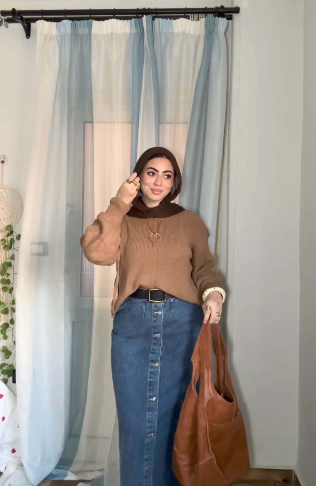 Cafe knitted pullover with tie sleeves.